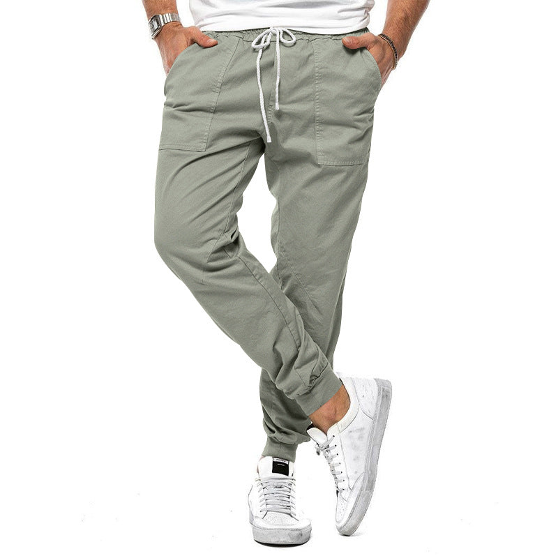 Comfortabele groene heren joggingbroek met sportieve look en zakken, ideaal voor ontspanning en activiteiten.