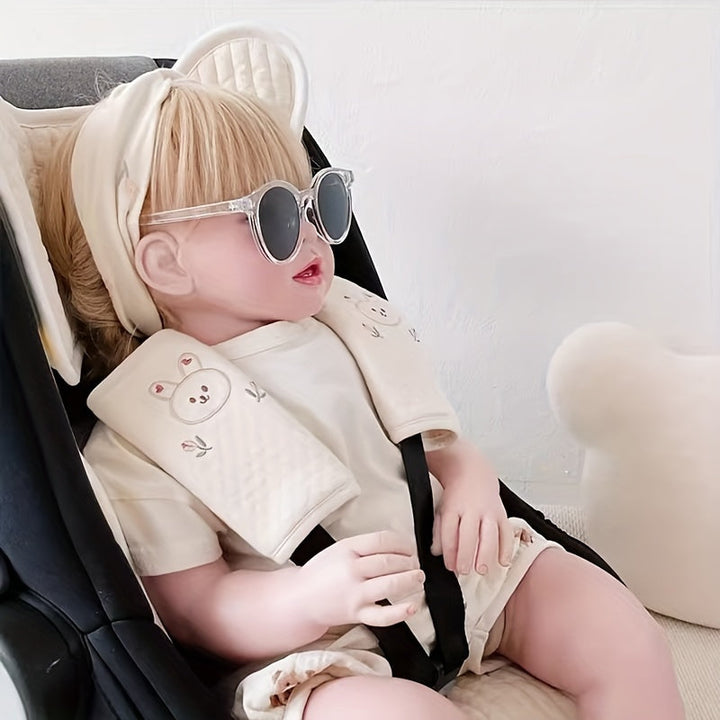 Duurzame schouderpads met dierenprint, beschermt de tere kinderhuid tegen schuren van kinderwagen- en autostoelriemen.