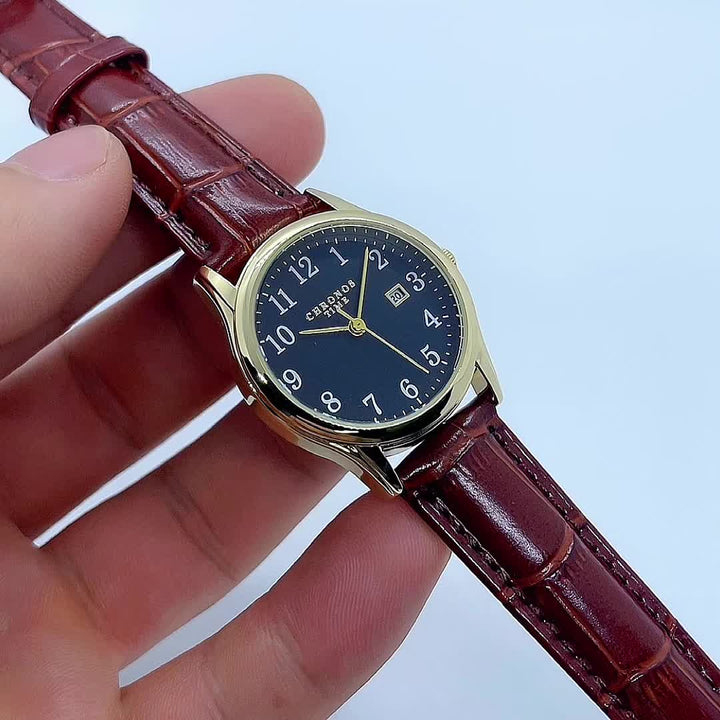 Klassiek dameshorloge met tijdloos ontwerp en soepele leerlook band. Een stijlvol en elegant accessoire.