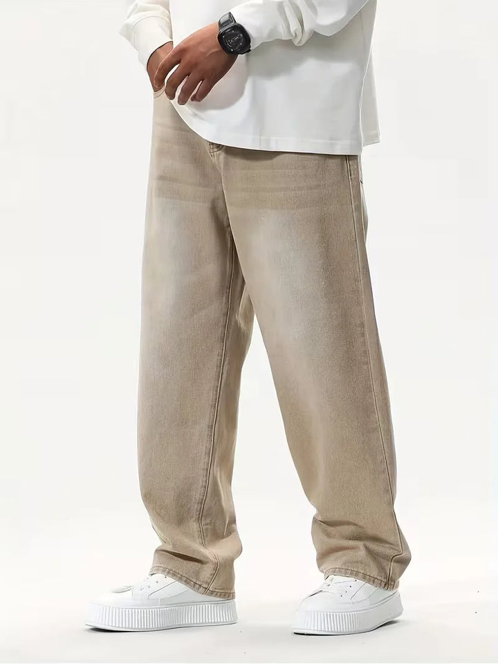 Kaki heren loose fit wide leg jeans met mid-rise, trendy voor streetwear en casual lente/zomer outfits.