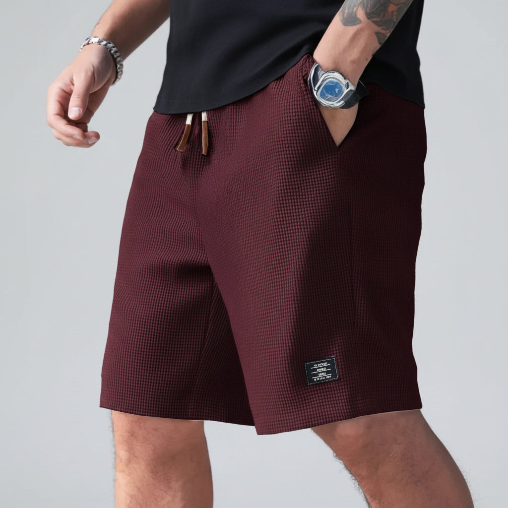 Duurzame heren casual short met verstelbaar trekkoord en diepe zakken, perfect voor sport en ontspanning.