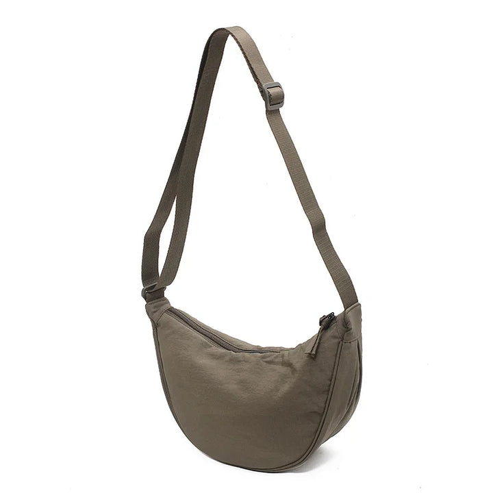 Trendy dames crossbody tas in dumpling model, perfect als dagelijkse tas of modieus cadeau.