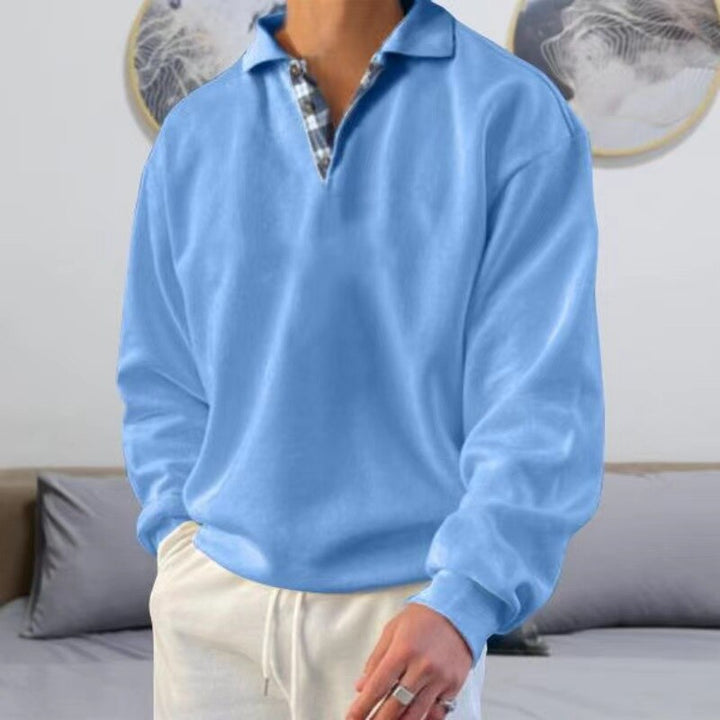 Warme en comfortabele heren trui met lange mouwen en een klassiek design. Perfect voor koudere dagen.