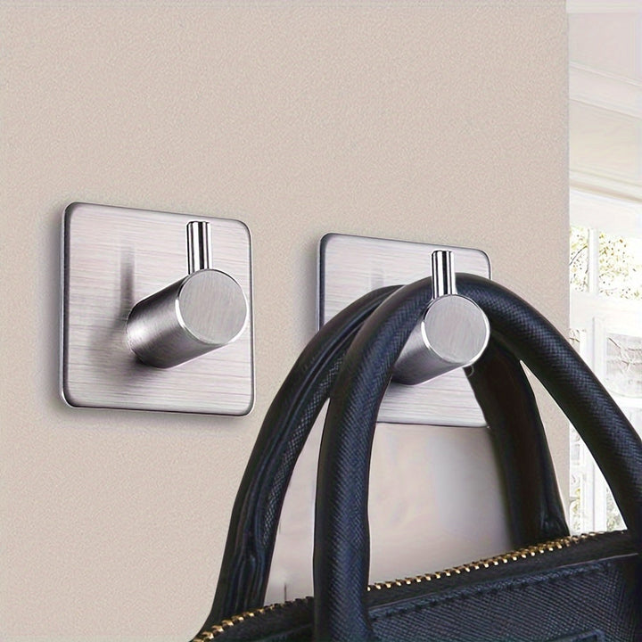 Boorvrije zelfklevende RVS wandhaken set (4 stuks) voor badkamer en keuken, snelle installatie.