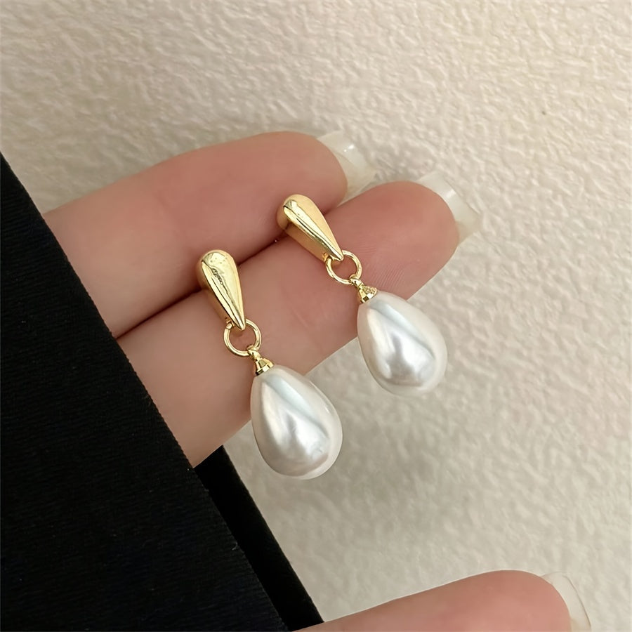 Luxe dames hangende oorbellen, elegant en stijlvol voor bruiloft of feest. Gouden sieraden voor speciale gelegenheden.