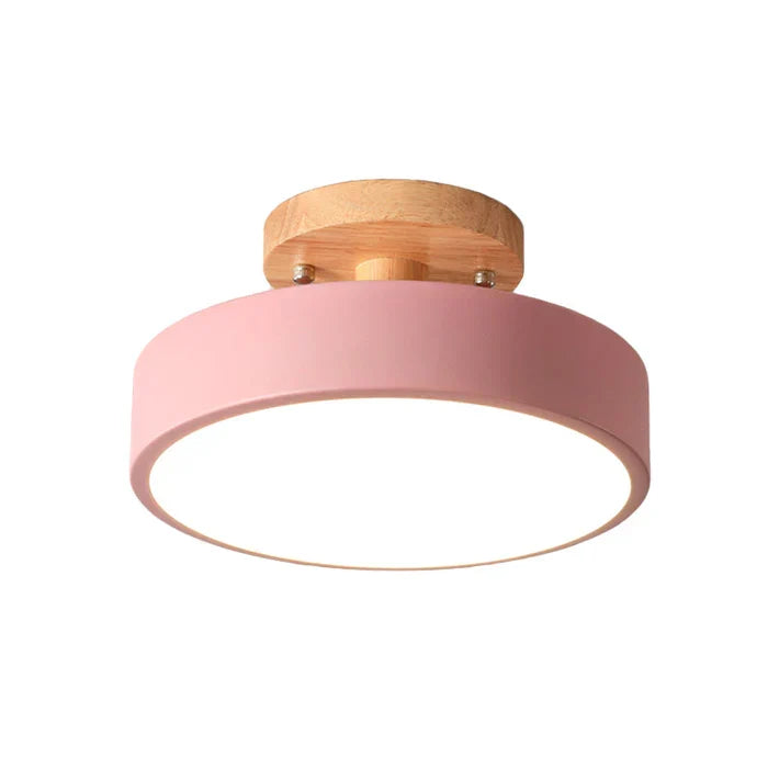 Scandinavische LED plafondlamp met dimbare tricolor functie, creëert diverse sferen in elke moderne ruimte.