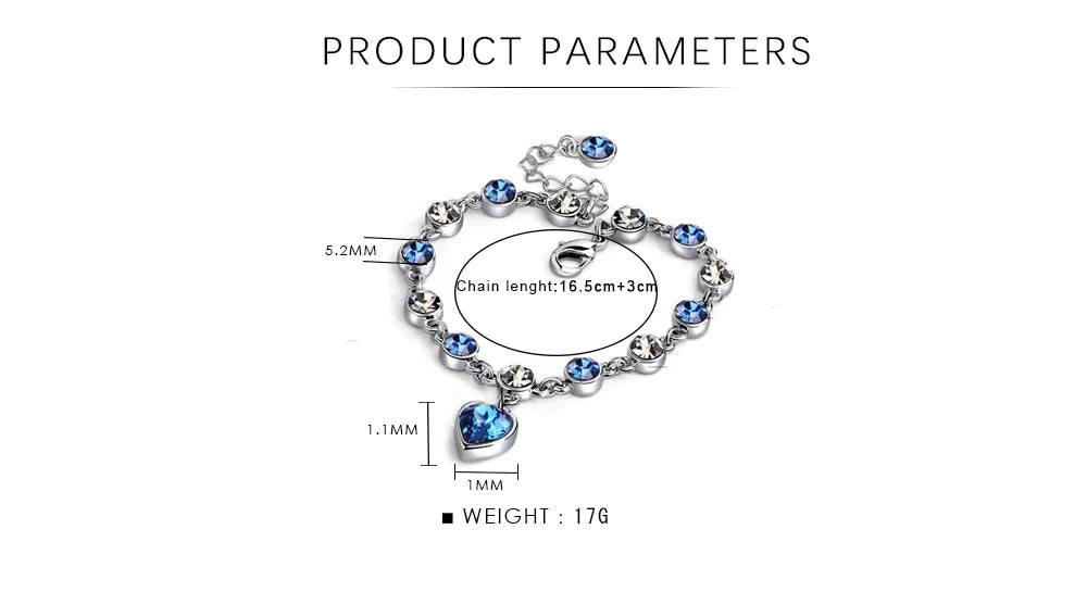 Moderne damesarmband met oceaanhart kristal en een subtiele blauwe zirkonia hartbedel. Verstelbaar design.
