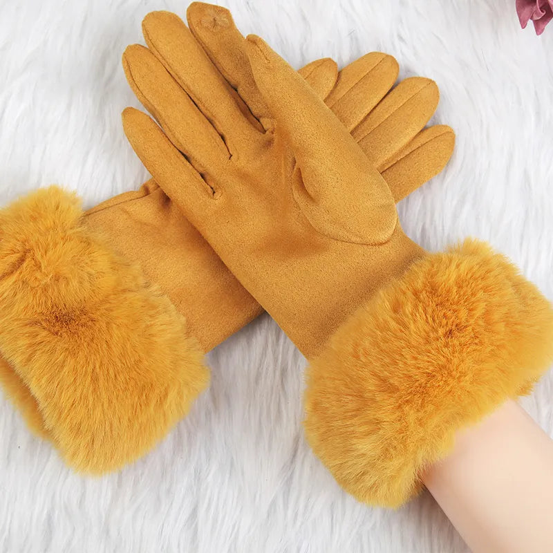 Zwarte suède handschoenen dames, stijlvol design met zacht imitatiebont langs de manchet.