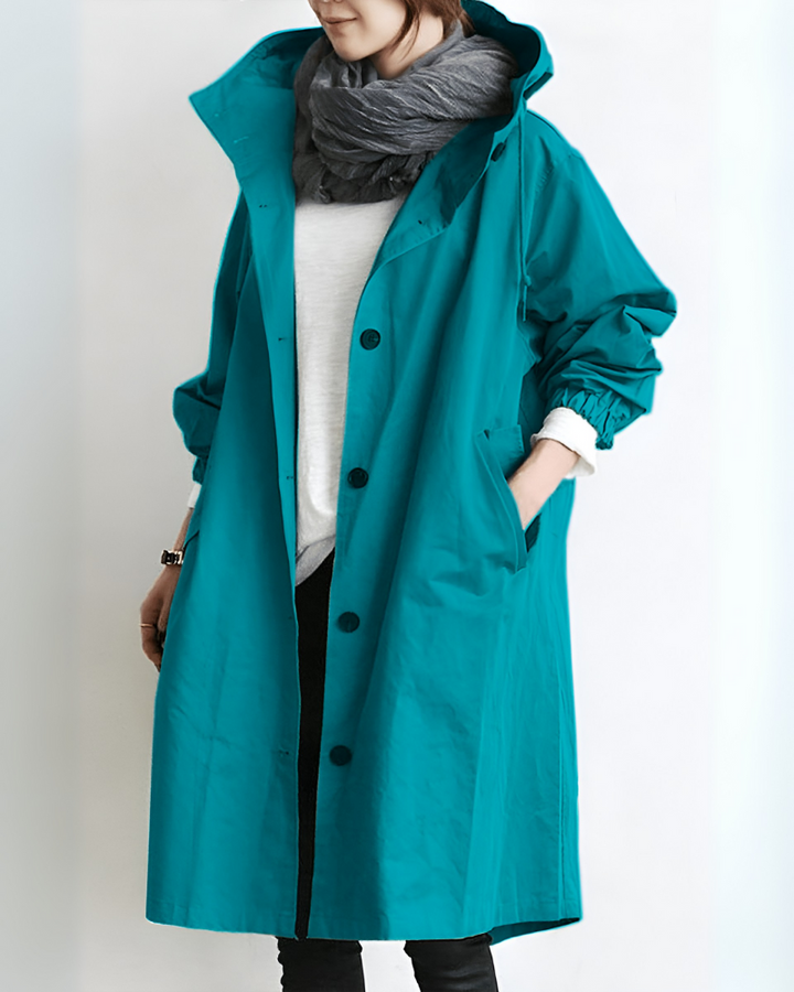 Moderne dames trenchcoat met capuchon, veelzijdige jas voor zowel casual als elegante looks.