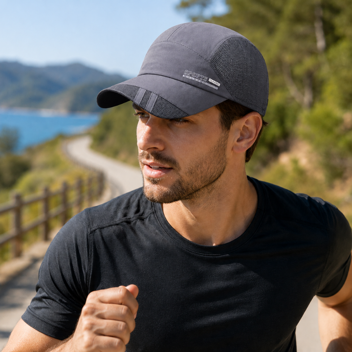 Stijlvolle unisex sportpet, ademend en verstelbaar voor ultiem draagcomfort tijdens sport.