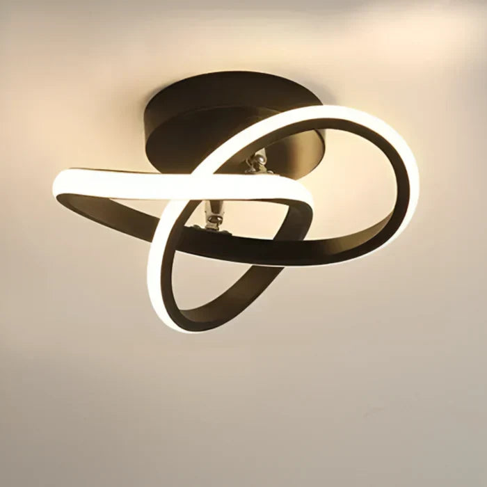 Detailopname van moderne LED plafondlamp met dubbel ringontwerp. Accentueert het strakke design.