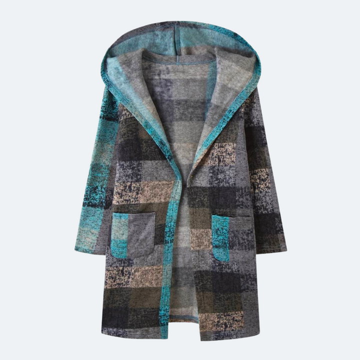 Trendy dames cardigan met capuchon in kleurrijke blockpatronen. Warme en modieuze dameskleding.