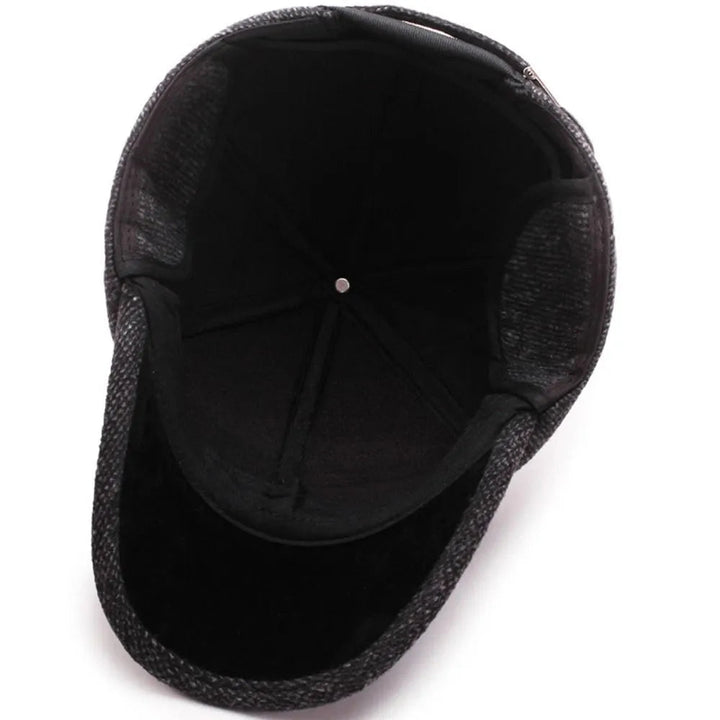 Warme heren wollen pet met klassieke look. Perfecte wintermuts met verstelbare pasvorm.