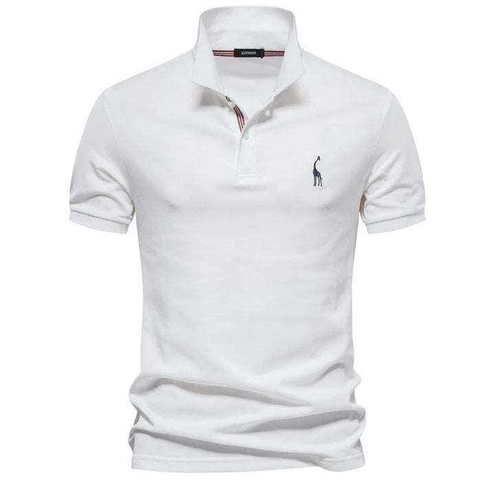 Luxe herenpolo met verfijnd hertenborduursel; combineert stijl en comfort voor een exclusieve herenlook.
