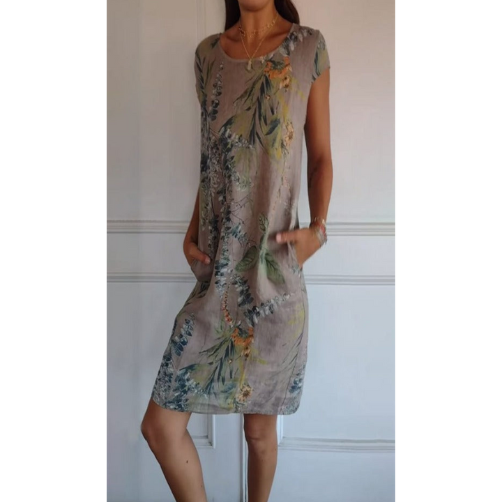 Veelzijdige elegante damesjurk, comfortabel voor zomer en lente. Modieuze midi-lengte, casual chic.