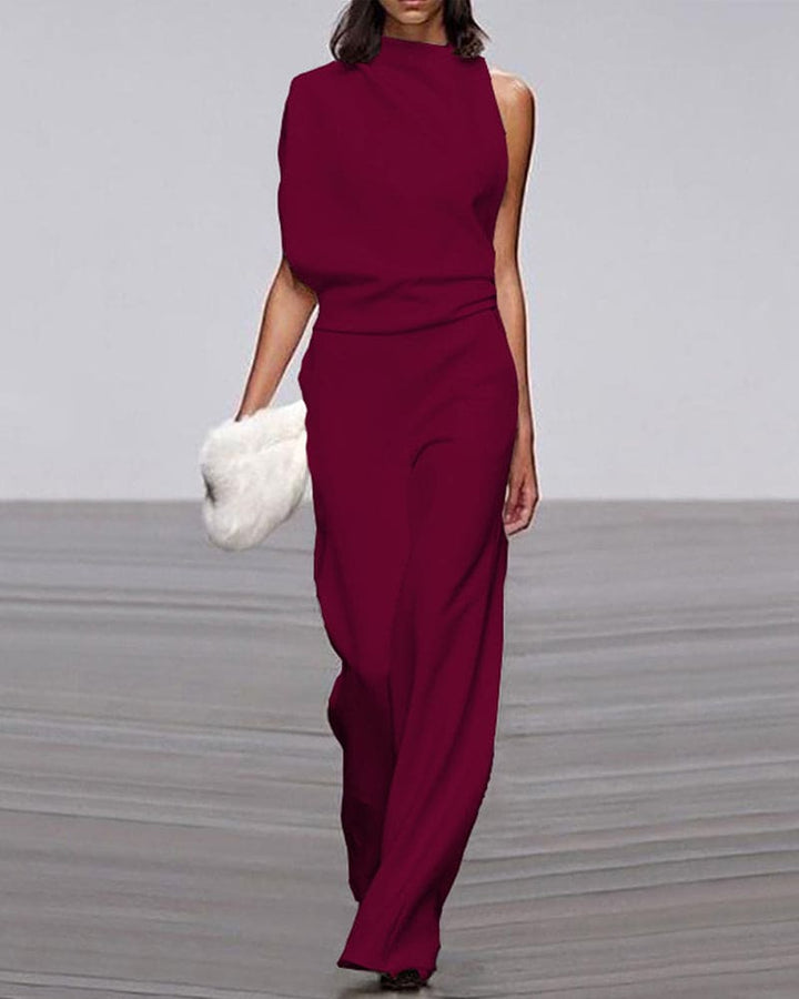 Modieuze dames jumpsuit met opstaande kraag en hoge taille, accentueert het figuur met elegantie.