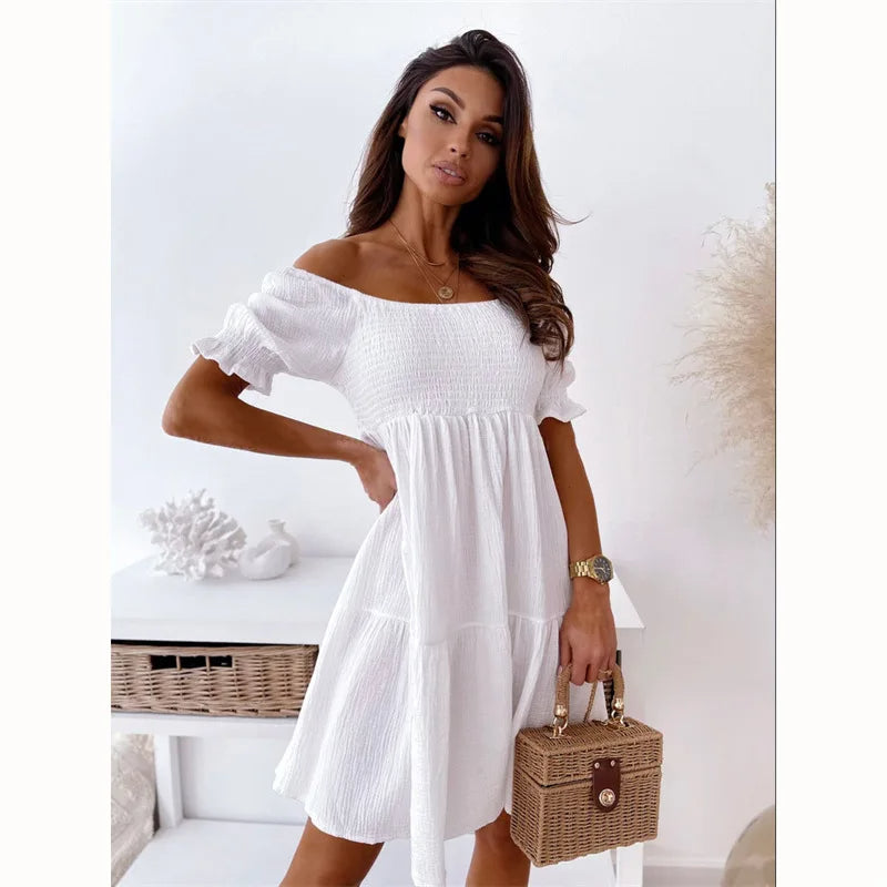 Perfecte A-lijn zomerjurk voor dames. Deze one-shoulder jurk met open rug zorgt voor een frisse en stijlvolle look.
