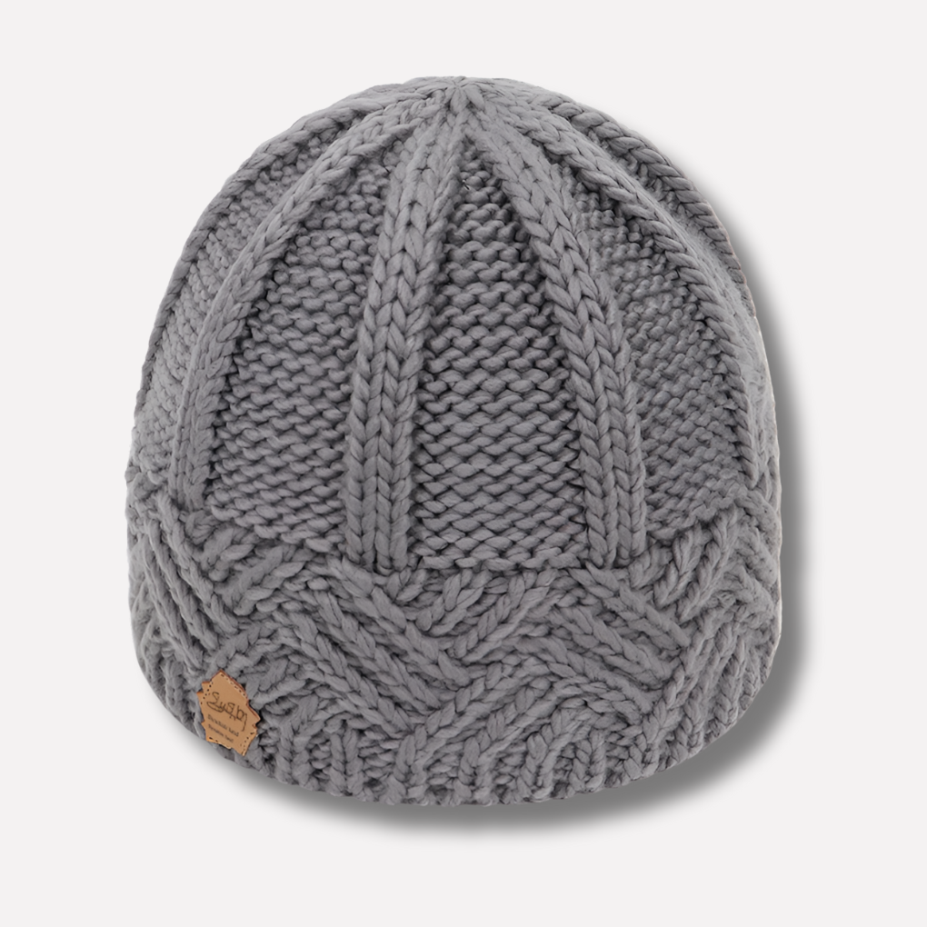 Stijlvolle gebreide muts, een warme dames beanie. Perfect accessoire voor een complete look.