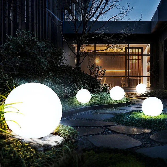Ronde LED sfeerlicht tuinverlichting, waterdicht en draadloos, met duurzame zonne-energie.