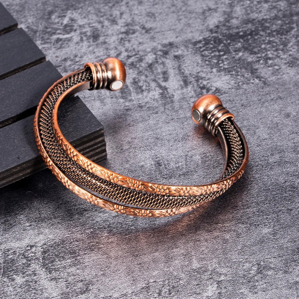Elegante roodkoperen open armband voor dames, verstelbaar, perfect voor een stijlvolle vintage look.