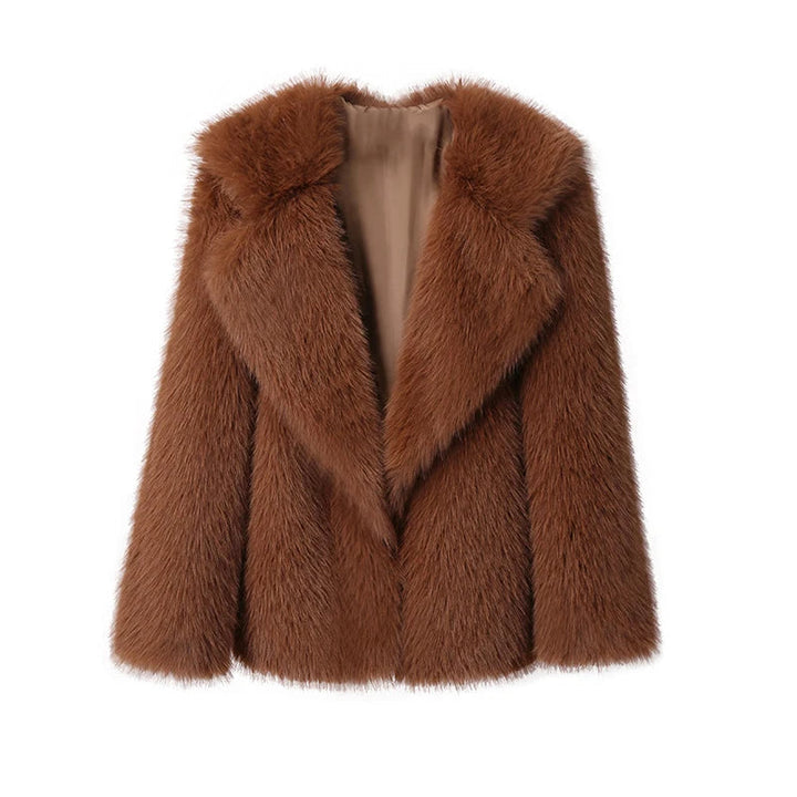 Zachte en warme dames winterjas, pluizig en oversized, perfect voor de winter.