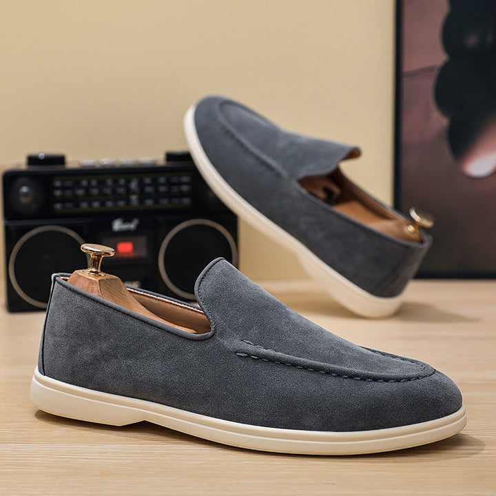 Grijze casual heren instappers, comfortabele slip-on schoenen perfect voor herenmode en dagelijkse vrijetijdsbesteding.