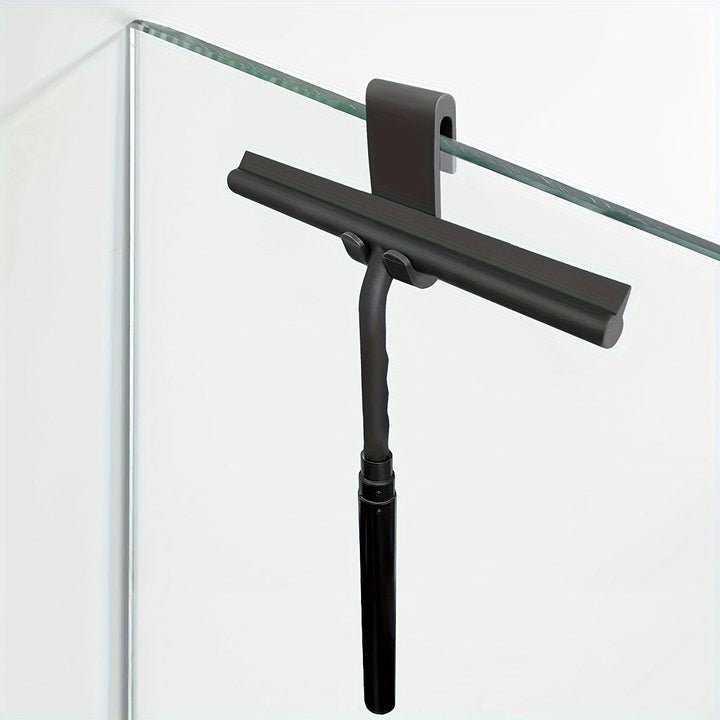 Zwarte streeploze douchewisser met ergonomische grip, ideaal voor comfortabel schoonmaken van je badkamer.