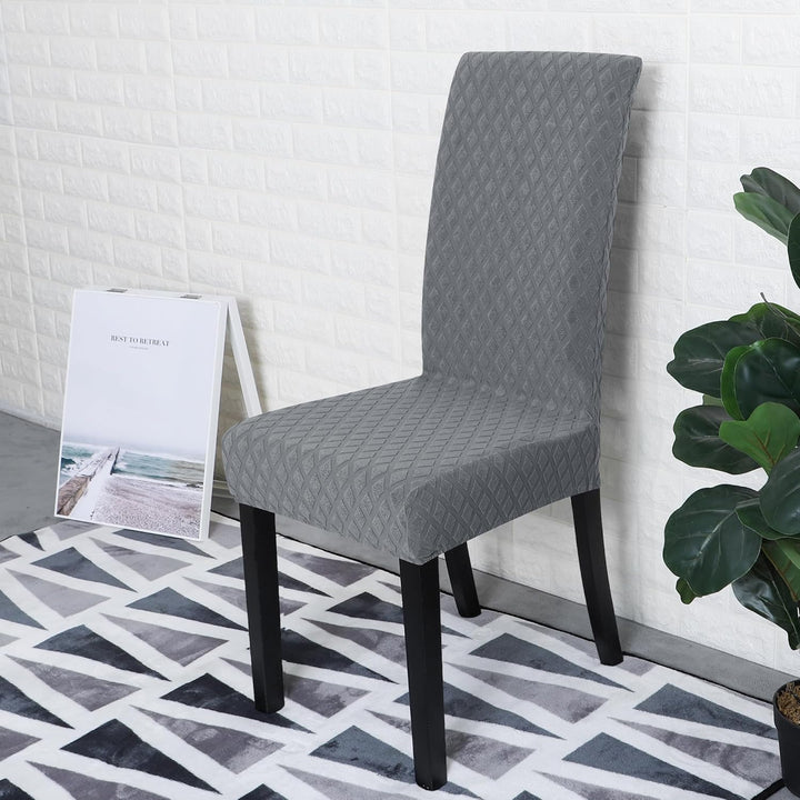 Stijlvolle rekbare eetkamerhoezen, geeft uw interieur een boost.