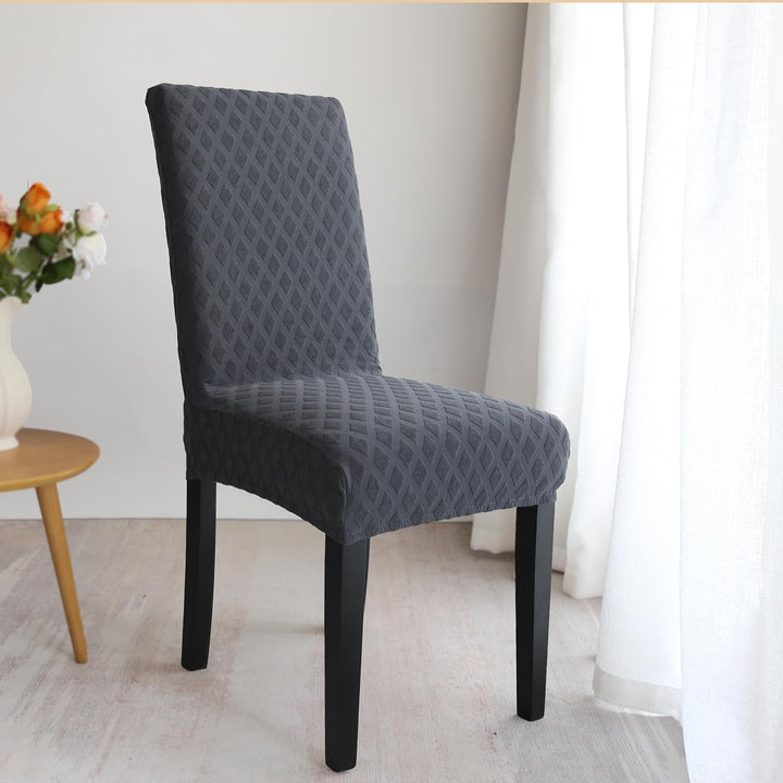 Rekbare eetkamerstoelhoezen set, perfecte bescherming en stijl voor uw interieur.
