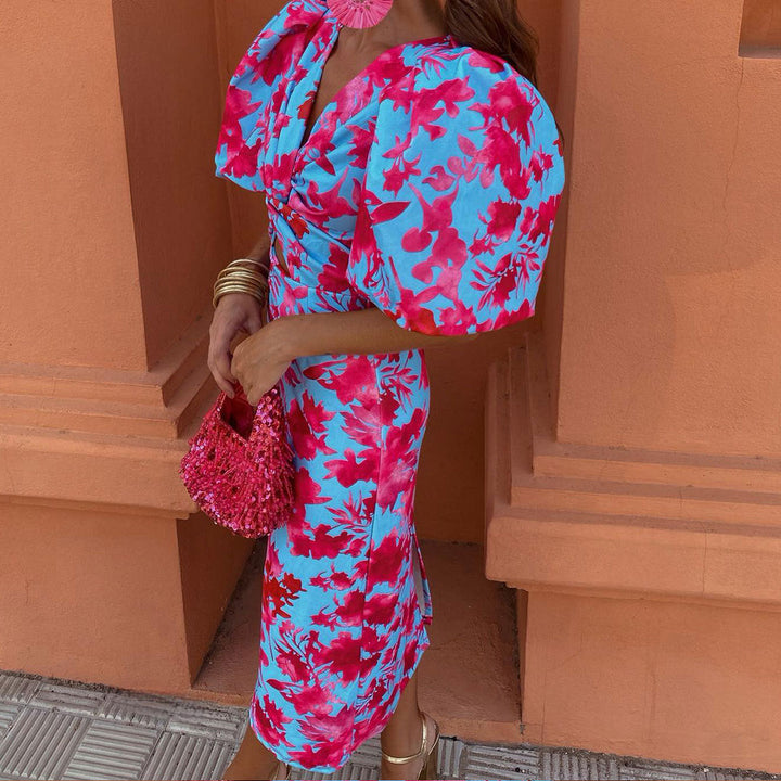 Modieuze dames midi-jurk met elegante bloemenprint. Een stijlvolle zomerjurk perfect voor elke gelegenheid.