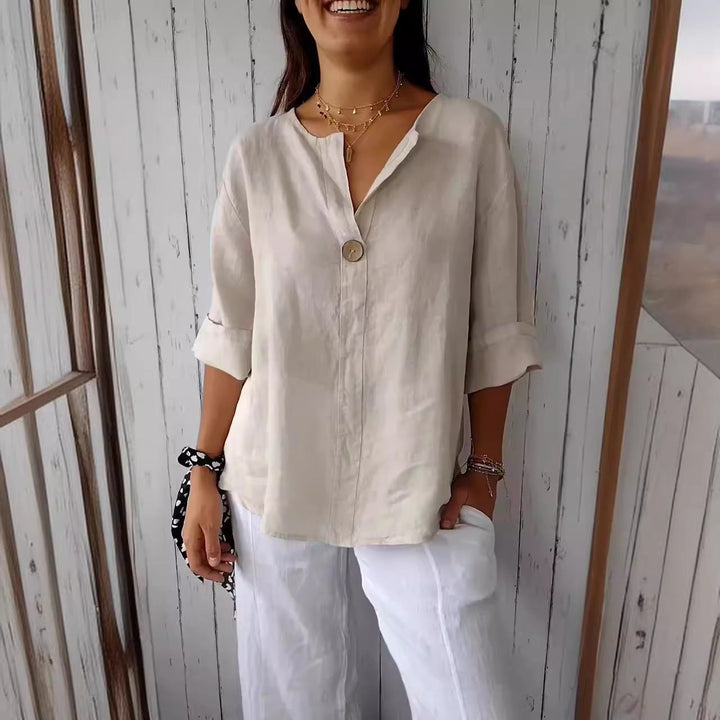 Elegante damesblouse CJ26 met V-hals en 3/4 mouw. Ideaal voor dagelijks comfort of werk.