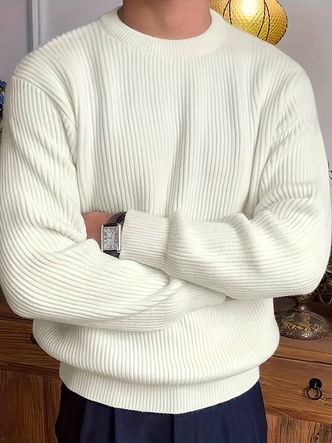 Close-up van de zachte, gebreide textuur van een warme heren winter trui. Comfortabel en modieus.