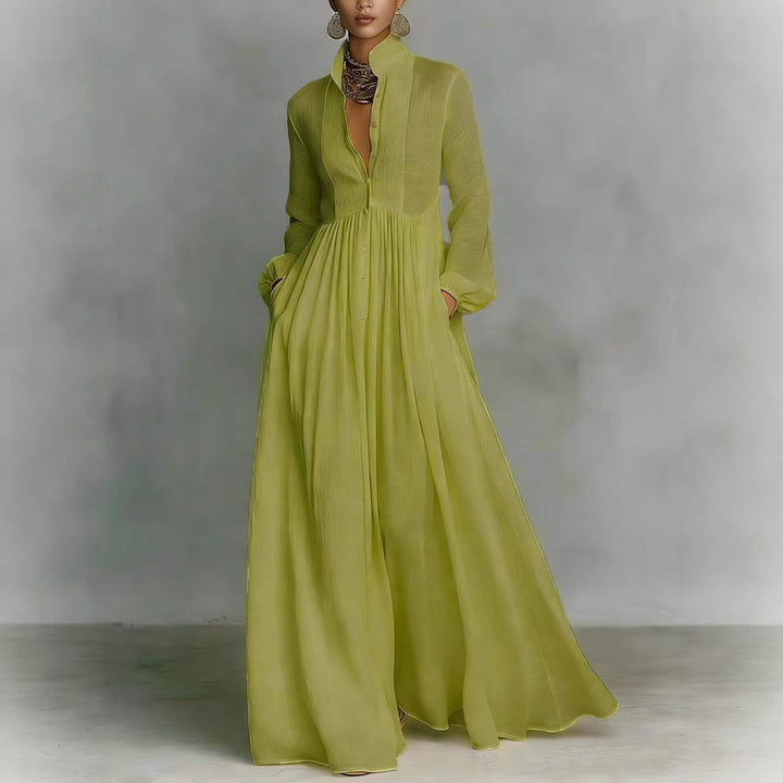 Comfortabele dames maxi-jurk met plooien en lange mouwen. Franse stijl, perfect voor lentecollectie.
