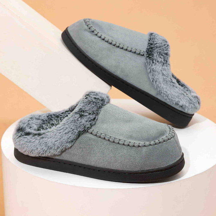 Grijs heren winterpantoffel met zachte voering voor maximale warmte en comfort. Perfect als relaxschoen.