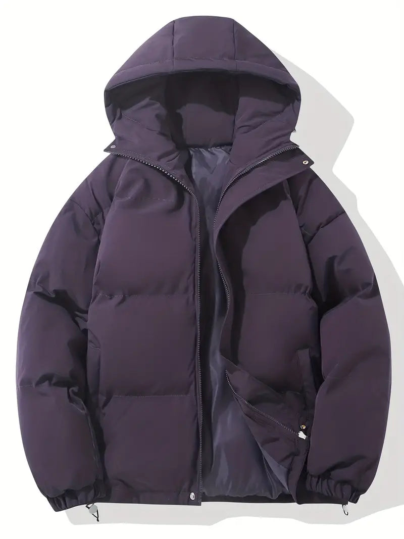 Detail van de dikke, warme stof van de casual heren winterjas met capuchon, perfect als buitenjas.