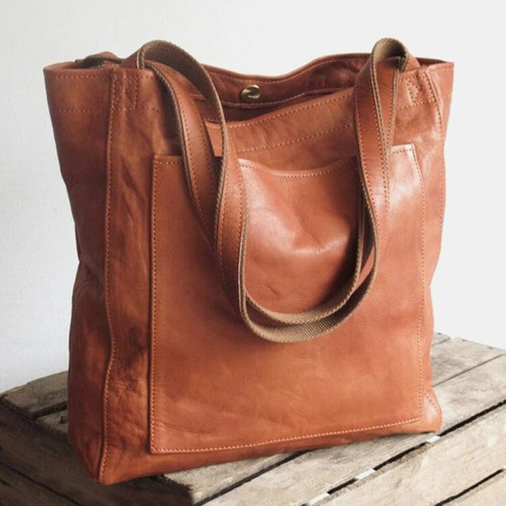 Stijlvolle koffiekleurige dames tote schoudertas van PU leer, perfect als elegante handtas voor werk of dagelijks gebruik.