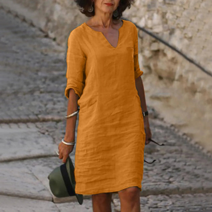 Dames elegante midi zomerjurk. Stijlvolle damesmode voor zomerse evenementen en comfortabel dragen.