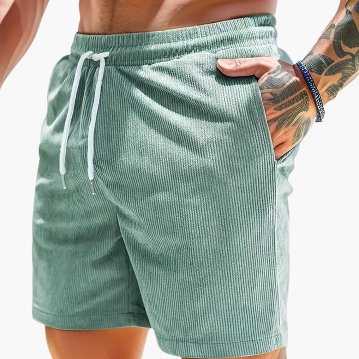 Kleurrijke heren shorts, modern en comfortabel, perfect voor een levendige zomerlook en strandactiviteiten.