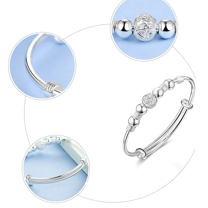 Stijlvolle damesarmband met zilveren gelukskralen, een prachtig cadeau en elegant accessoire.