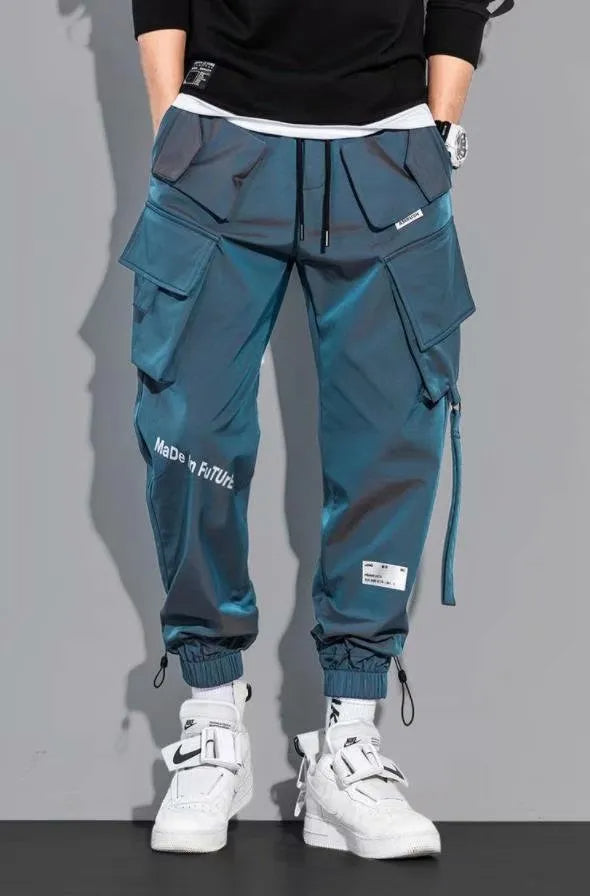 Grijze heren hiphop broek met elastische taille en zijzakken, perfect voor dagelijks comfort.