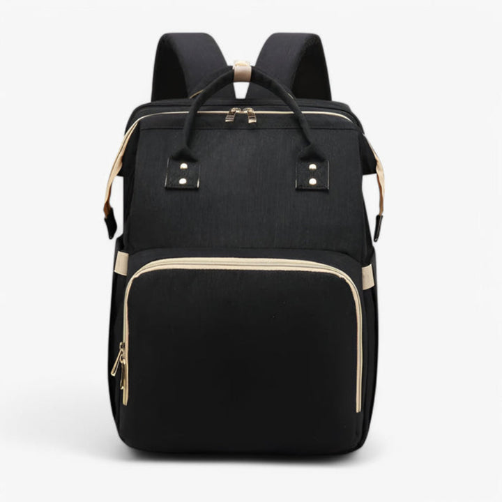 Comfortabel babybedje geïntegreerd in waterafstotende luiertas, perfect voor dutjes tijdens reizen.