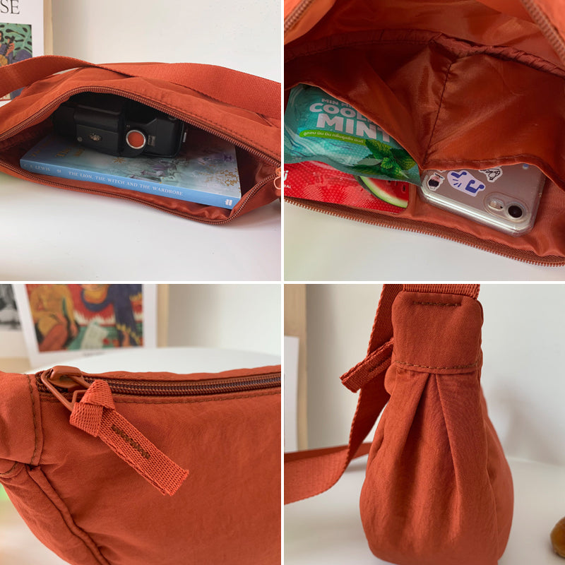 Dagelijkse stijl met de Luna damestas, een compacte en veelzijdige halvemaan crossbody.