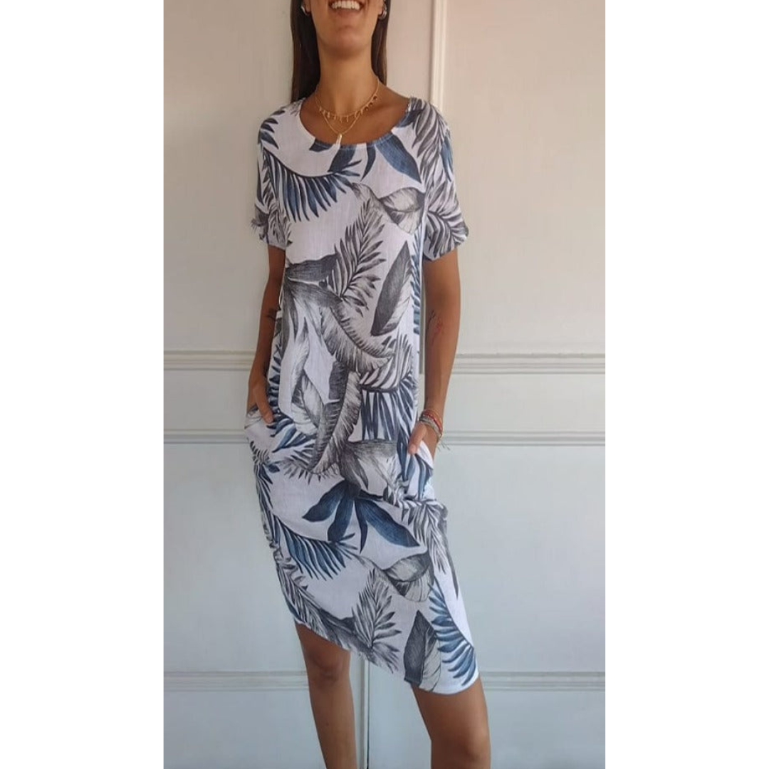 Comfortabele midi damesjurk, elegant en modieus. Geschikt als zomer- of lente jurk, veelzijdig en stijlvol.