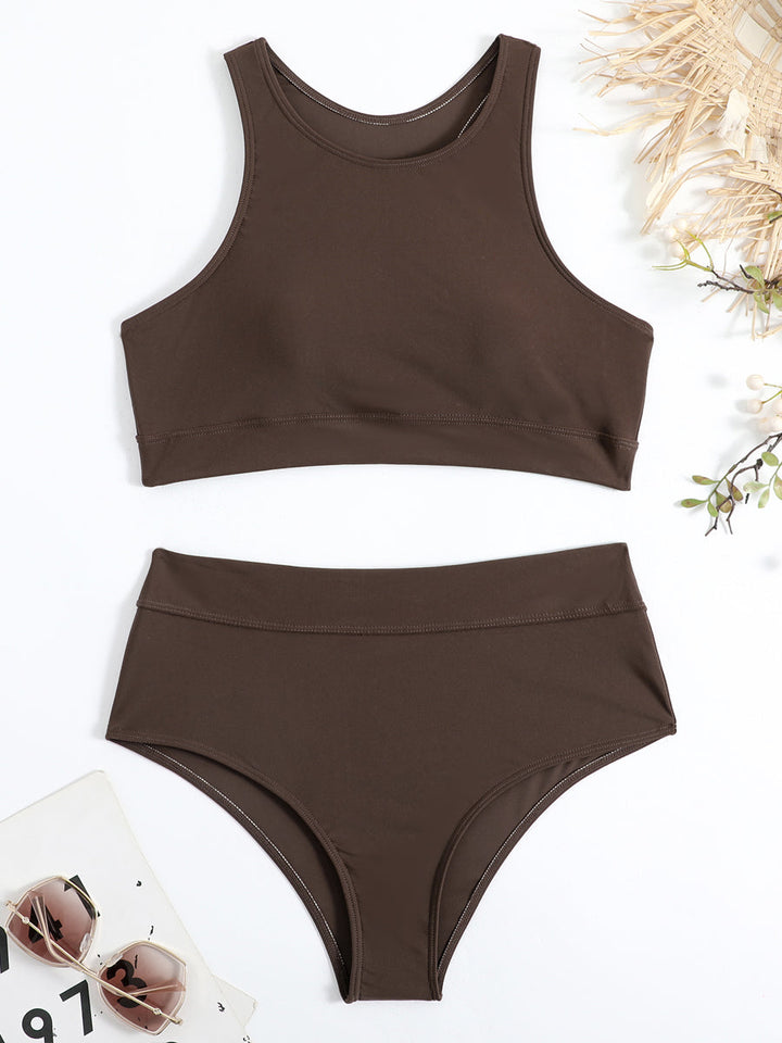 Nieuwe dames sportieve high-waist bikini. Racerback top biedt comfort en stijl voor zwemmen en strandmode.