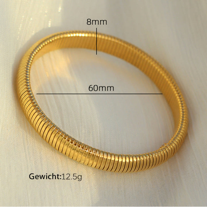Unieke trendy dames armband met kleurblok design, modern en elegant van goudkleurig staal.