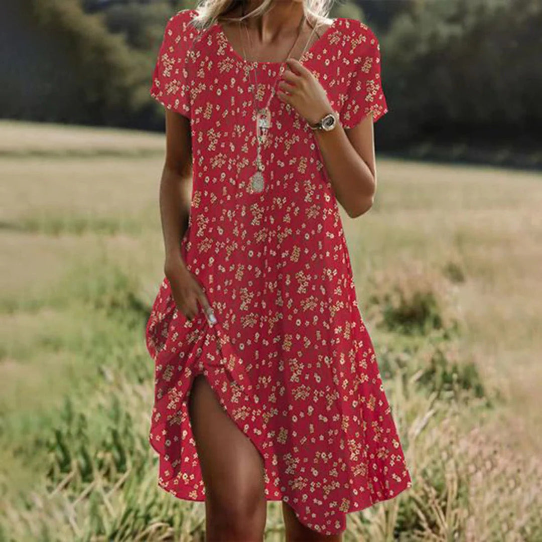 Bohemian dames zomerjurk CJ26: comfortabele midi met artistiek etnisch patroon en ronde hals.