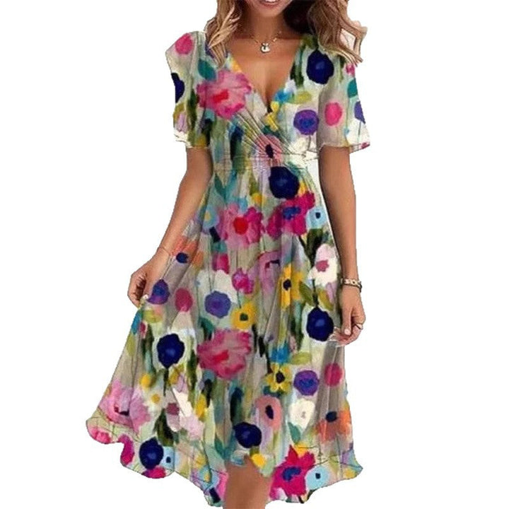 Trendy damesjurk CJ26: bloemenprint, V-hals, korte mouwen en comfortabel A-lijn model.