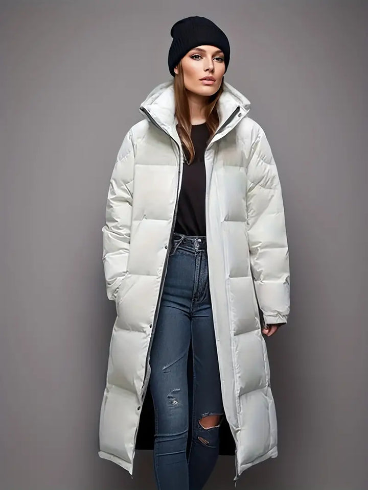 Dames lange parka pufferjas, ultiem warm en modieus, essentieel voor koude winterdagen.
