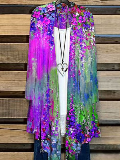 Comfortabel dames vest Liva met subtiele bloemenprint. Een stijlvol, lang en losvallend oversized vest van katoenmix.