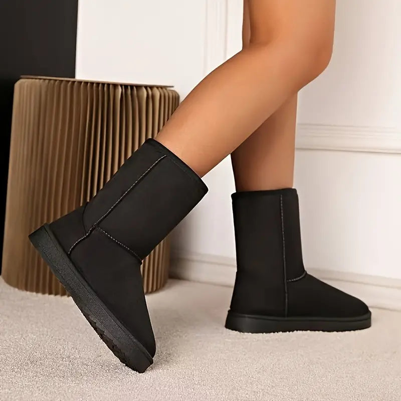 Zwarte waterdichte Aria slip-on winterlaarzen. Unisex warme boots met antislipzool, perfect voor wintermode.